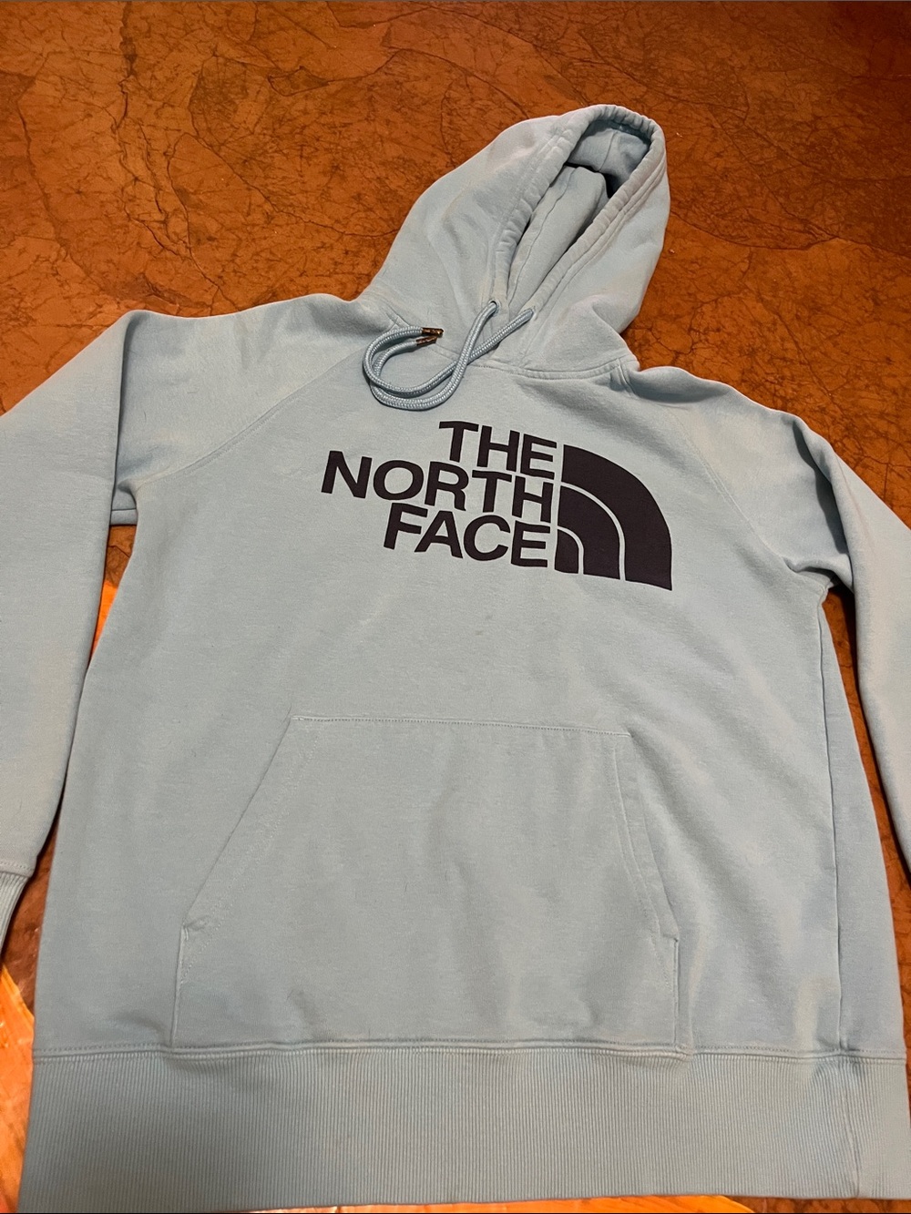 The North Face womenโs Light Blue Crewneck Hoodie with Black Logo Sz Small